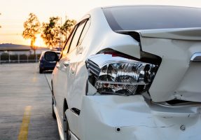 smashed-up white car