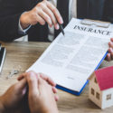 insurance-broker-going-over-policy-with-customer