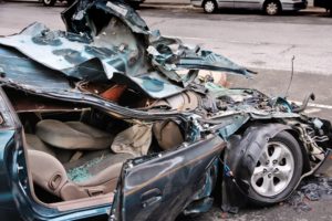 totaled black car