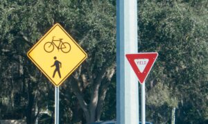 bicycle-and-yield-signs-together