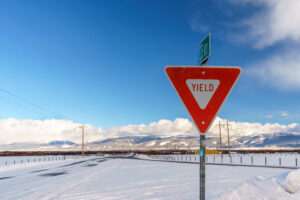 yield-sign-with-clouds