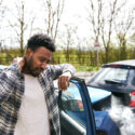 A driver has neck pain after a collision. A personal injury attorney can help drivers hit by uninsured motorists seek compensation.