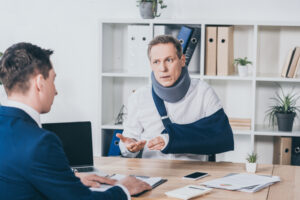 An injured client talks to a car accident attorney about a punitive damages claim for a Georgia crash.